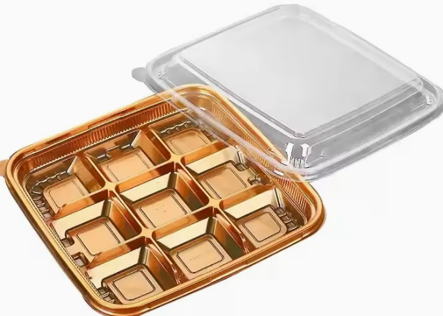 How does the Nine Grid PET Blister Packaging Box prevent product movement within each compartment, especially for delicate items requiring precise positioning?